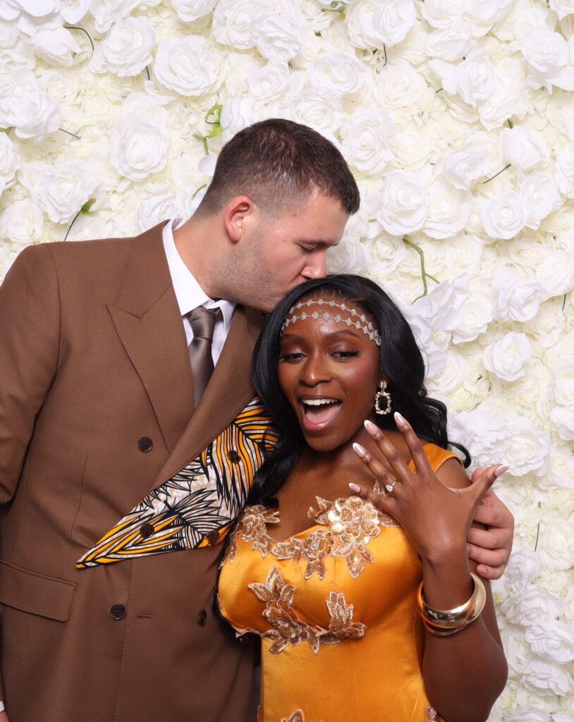 Wedding couple photobooth showing ring